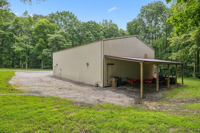 2907 York Rd, Pleasant View, TN 37146 - view of pole building with a wooded view