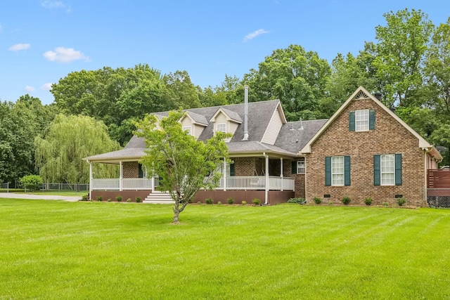 2907 York Rd, Pleasant View, TN 37146 - view of front facade featuring covered porch, crawl space, brick siding, and a front yard