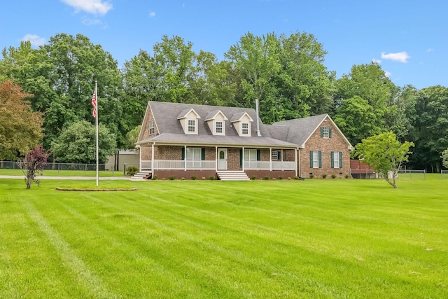2907 York Rd, Pleasant View, TN 37146 - cape cod home featuring a porch and brick siding