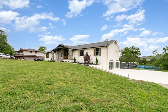 95 Short Dr, Mount Juliet, TN 37122 - view of front facade featuring concrete driveway, a front lawn, and stucco siding