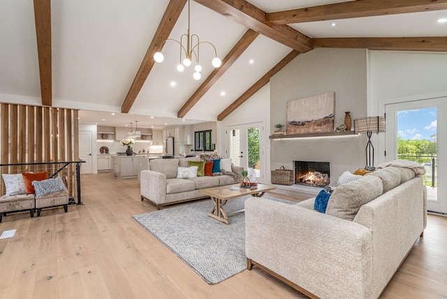 95 Short Dr, Mount Juliet, TN 37122 - living room with a lit fireplace, high vaulted ceiling, beamed ceiling, light wood finished floors, and recessed lighting
