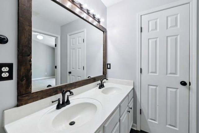 bathroom featuring double vanity