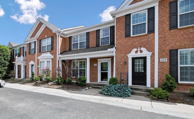 multi unit property featuring brick siding