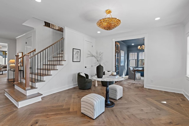 entryway with baseboards, stairs, recessed lighting, a chandelier, and crown molding