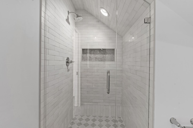 bathroom with a shower stall