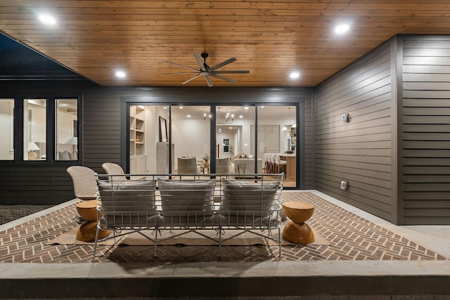 view of patio / terrace with a ceiling fan and outdoor dining area