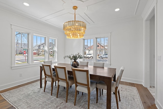 dining space featuring a chandelier, plenty of natural light, dark wood-style floors, recessed lighting, and ornamental molding