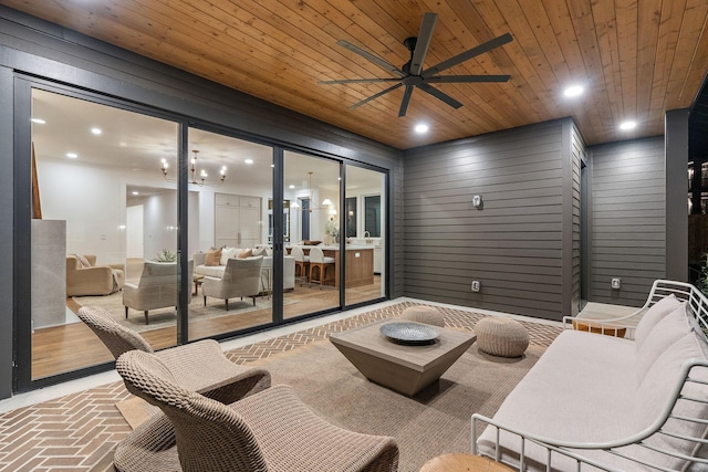 view of patio / terrace with an outdoor living space and ceiling fan