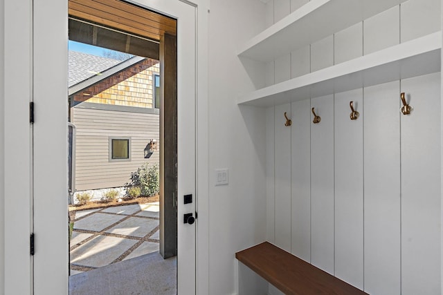 mudroom featuring carpet flooring