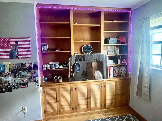office space featuring built in shelves