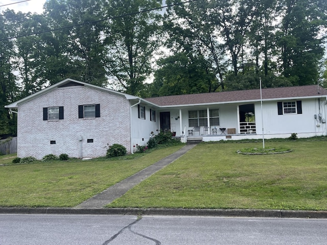 ranch-style home featuring a porch, crawl space, a front yard, and brick siding