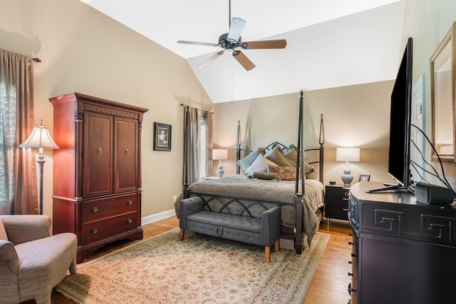 248 Stonehaven Cir, Franklin, TN 37064 - bedroom featuring light wood-style floors, multiple windows, lofted ceiling, baseboards, and a ceiling fan
