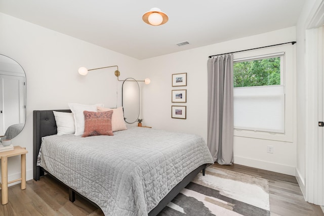 1411A Boscobel St, Nashville, TN 37206 - bedroom featuring light wood-style flooring and baseboards