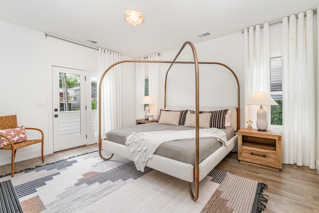 1411A Boscobel St, Nashville, TN 37206 - bedroom featuring light wood finished floors and access to outside
