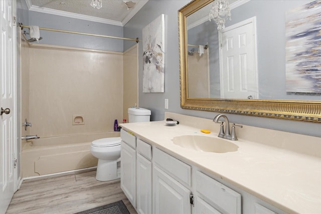 1505 Roane St, Covington, TN 38019 - bathroom featuring wood finished floors, toilet, crown molding, shower / tub combination, and vanity