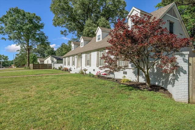 1505 Roane St, Covington, TN 38019 - view of property exterior with a shingled roof and brick siding