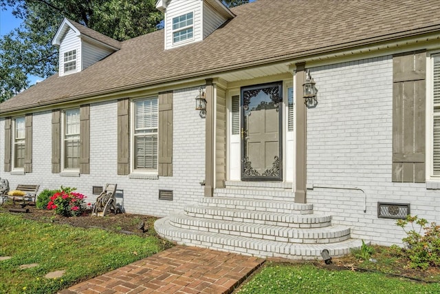 1505 Roane St, Covington, TN 38019 - entrance to property featuring brick siding, a shingled roof, and crawl space
