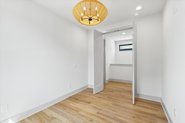 2010B 9th Ave N, Nashville, TN 37208 - unfurnished bedroom with a chandelier, light wood-style floors, baseboards, and recessed lighting