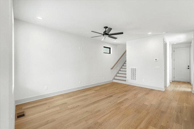 2010B 9th Ave N, Nashville, TN 37208 - spare room featuring stairway, ceiling fan, light wood finished floors, recessed lighting, and baseboards