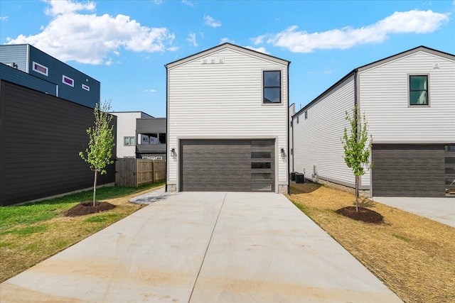 2010B 9th Ave N, Nashville, TN 37208 - modern home featuring driveway, an attached garage, and fence