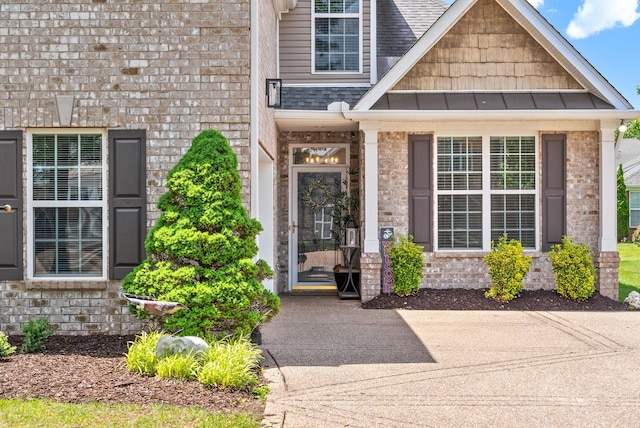 1113 Chickadee Cir, Hermitage, TN 37076 - entrance to property featuring brick siding and a shingled roof