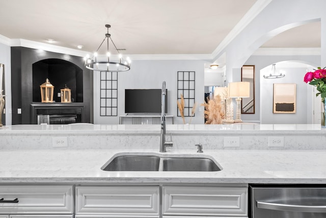 1113 Chickadee Cir, Hermitage, TN 37076 - kitchen featuring a sink, dishwasher, a chandelier, light stone countertops, and ornamental molding