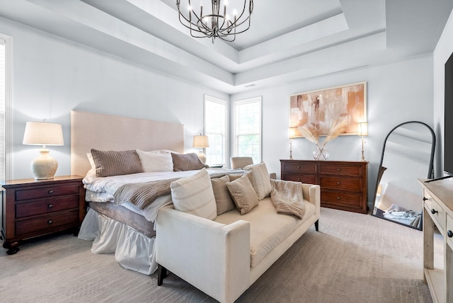 1113 Chickadee Cir, Hermitage, TN 37076 - bedroom with a chandelier, light carpet, and a tray ceiling