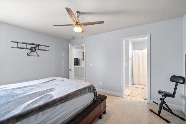 1113 Chickadee Cir, Hermitage, TN 37076 - bedroom with baseboards, ceiling fan, and connected bathroom