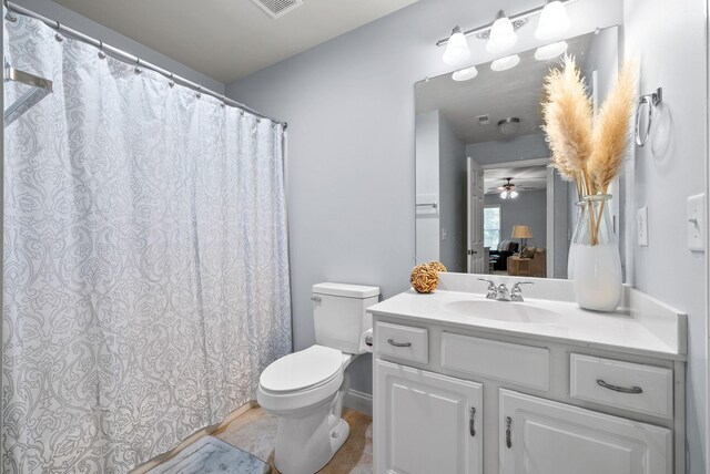 1113 Chickadee Cir, Hermitage, TN 37076 - full bathroom with toilet, vanity, a ceiling fan, and a shower with curtain