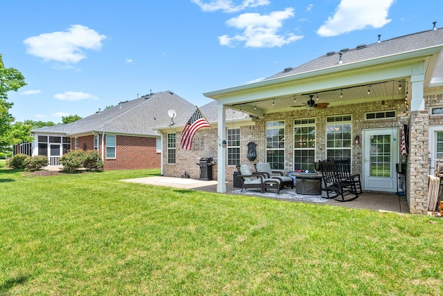 1113 Chickadee Cir, Hermitage, TN 37076 - rear view of house with a patio, ceiling fan, a lawn, and brick siding