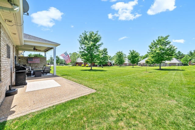 1113 Chickadee Cir, Hermitage, TN 37076 - view of grassy yard featuring a patio and a ceiling fan