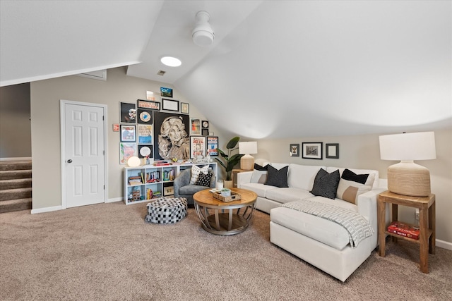 living room with carpet floors, lofted ceiling, baseboards, and stairs