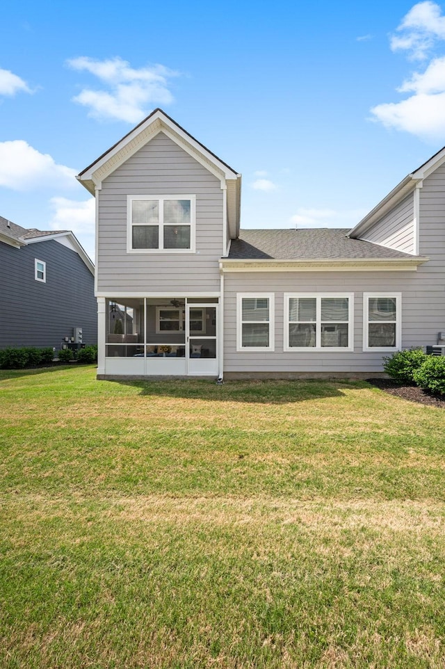 1626 Calcutta Dr, Murfreesboro, TN 37128 - back of house with a yard, a sunroom, and a shingled roof