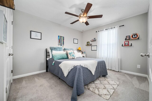1626 Calcutta Dr, Murfreesboro, TN 37128 - bedroom with light colored carpet, baseboards, and a ceiling fan