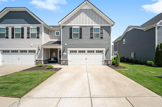 1626 Calcutta Dr, Murfreesboro, TN 37128 - craftsman house with a garage, driveway, board and batten siding, and a front lawn