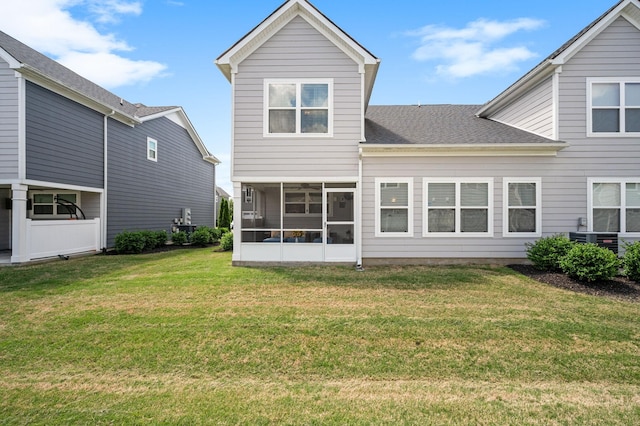1626 Calcutta Dr, Murfreesboro, TN 37128 - rear view of house featuring a sunroom, a lawn, roof with shingles, and central AC unit