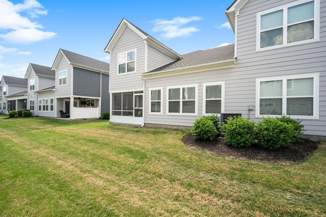 1626 Calcutta Dr, Murfreesboro, TN 37128 - rear view of property with a yard and a sunroom