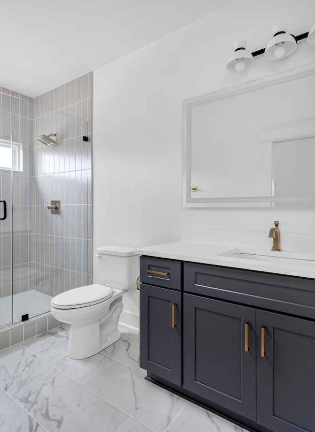 603B Freedom Ct, Nashville, TN 37209 - full bathroom with a shower stall, toilet, marble finish floors, and vanity