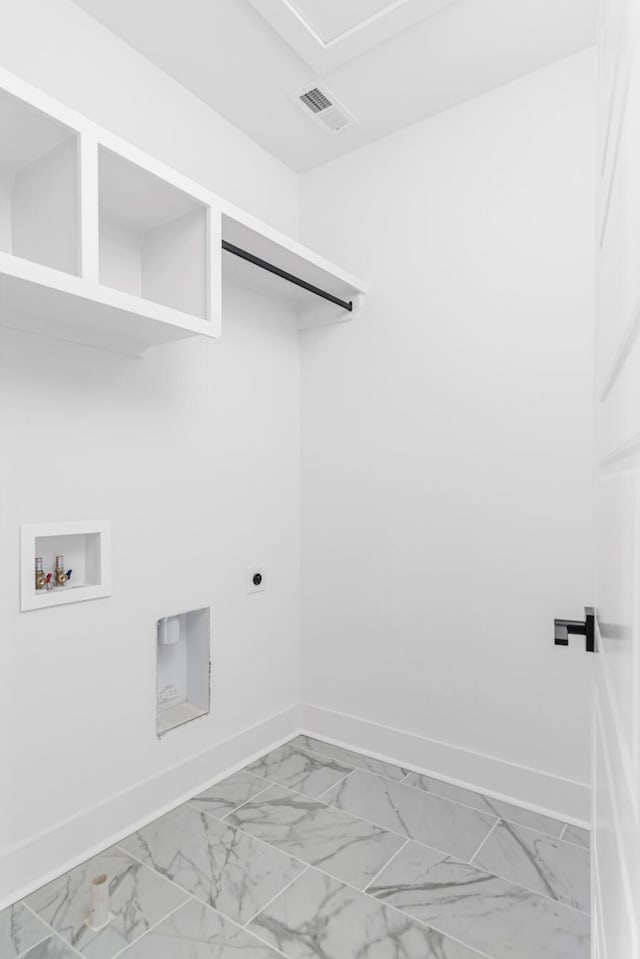 603B Freedom Ct, Nashville, TN 37209 - washroom featuring baseboards, hookup for an electric dryer, hookup for a washing machine, and light marble finish floors