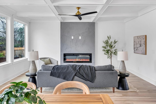 603B Freedom Ct, Nashville, TN 37209 - living area featuring a fireplace, wood finished floors, a ceiling fan, coffered ceiling, and beam ceiling
