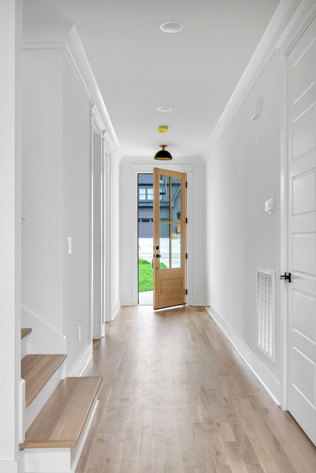 603B Freedom Ct, Nashville, TN 37209 - entrance foyer with light wood-style flooring, baseboards, and stairway