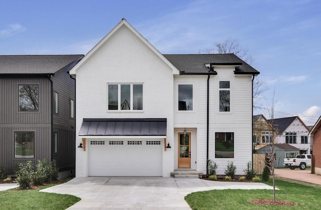 603B Freedom Ct, Nashville, TN 37209 - modern farmhouse featuring an attached garage, driveway, entry steps, brick siding, and roof with shingles