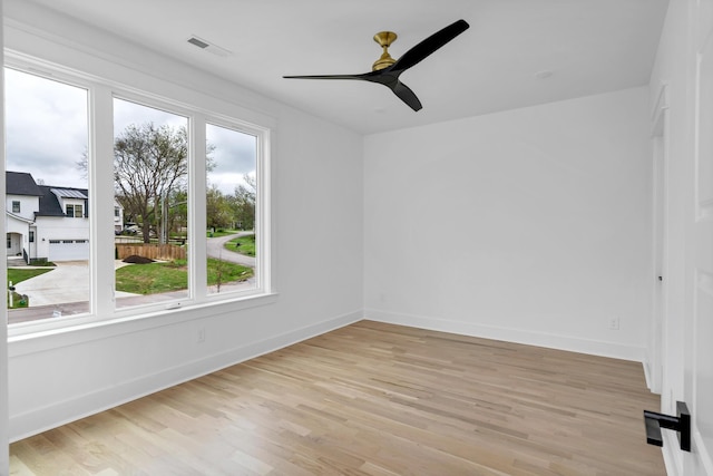 603B Freedom Ct, Nashville, TN 37209 - spare room with light wood-style flooring, a ceiling fan, and baseboards