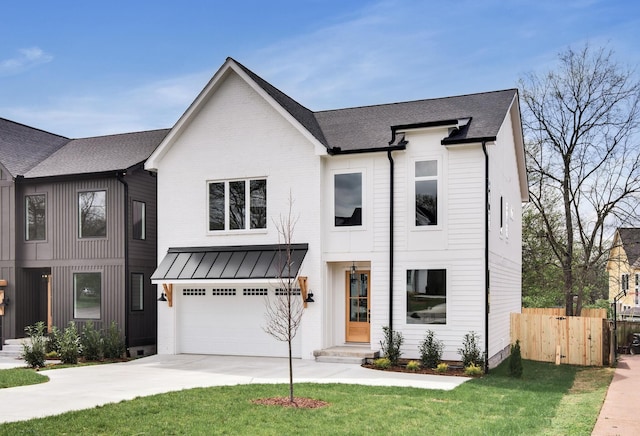 603B Freedom Ct, Nashville, TN 37209 - view of front of home with fence, an attached garage, driveway, and roof with shingles