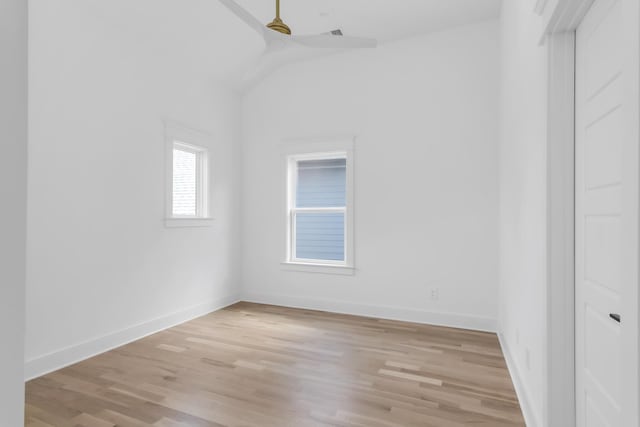 6401 Thunderbird Dr, Nashville, TN 37209 - spare room with light wood finished floors, vaulted ceiling, baseboards, and a ceiling fan