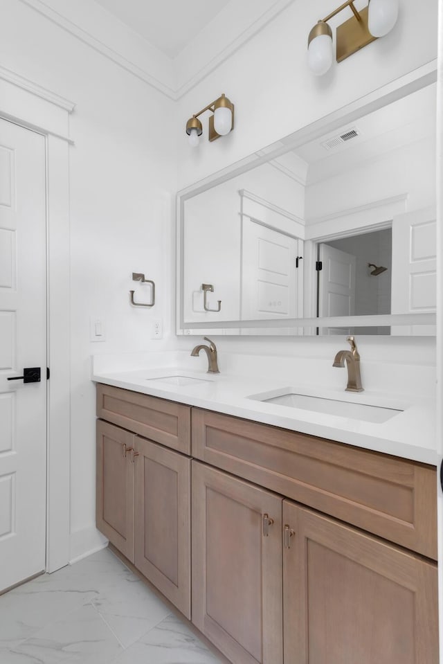 6401 Thunderbird Dr, Nashville, TN 37209 - bathroom featuring marble look tiles and double vanity