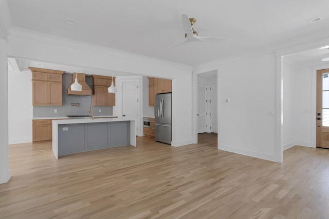 6401 Thunderbird Dr, Nashville, TN 37209 - kitchen featuring stainless steel fridge with ice dispenser, custom exhaust hood, light countertops, ceiling fan, and backsplash