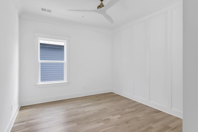 6401 Thunderbird Dr, Nashville, TN 37209 - empty room featuring a ceiling fan, light wood-style flooring, and crown molding