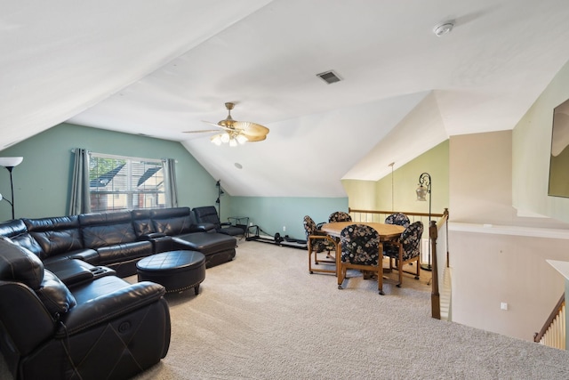 carpeted living room featuring lofted ceiling and a ceiling fan