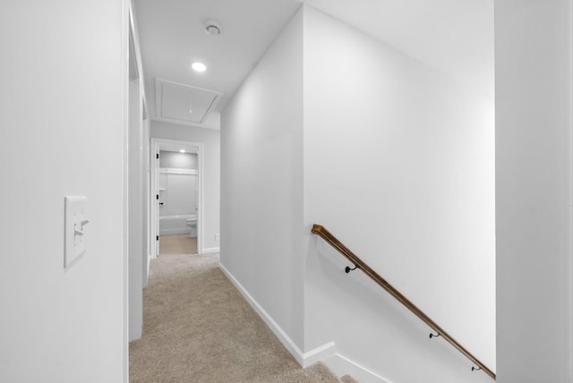 272 Kildeer Dr, Clarksville, TN 37040 - corridor with attic access, an upstairs landing, light colored carpet, and baseboards